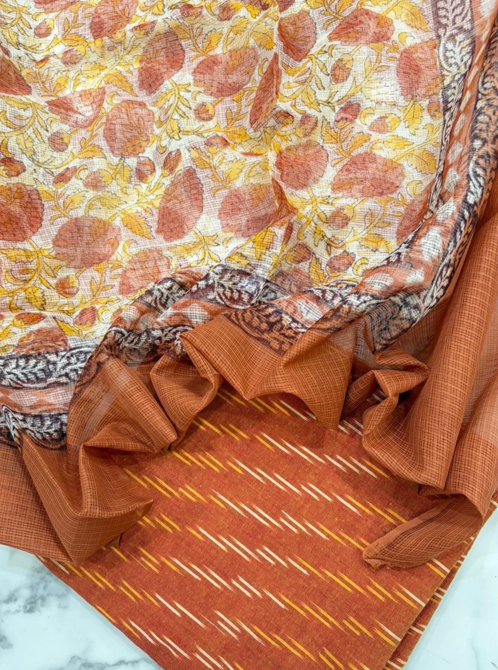 Rust orange Ikkat Kurta with Kotadoriya Dupatta