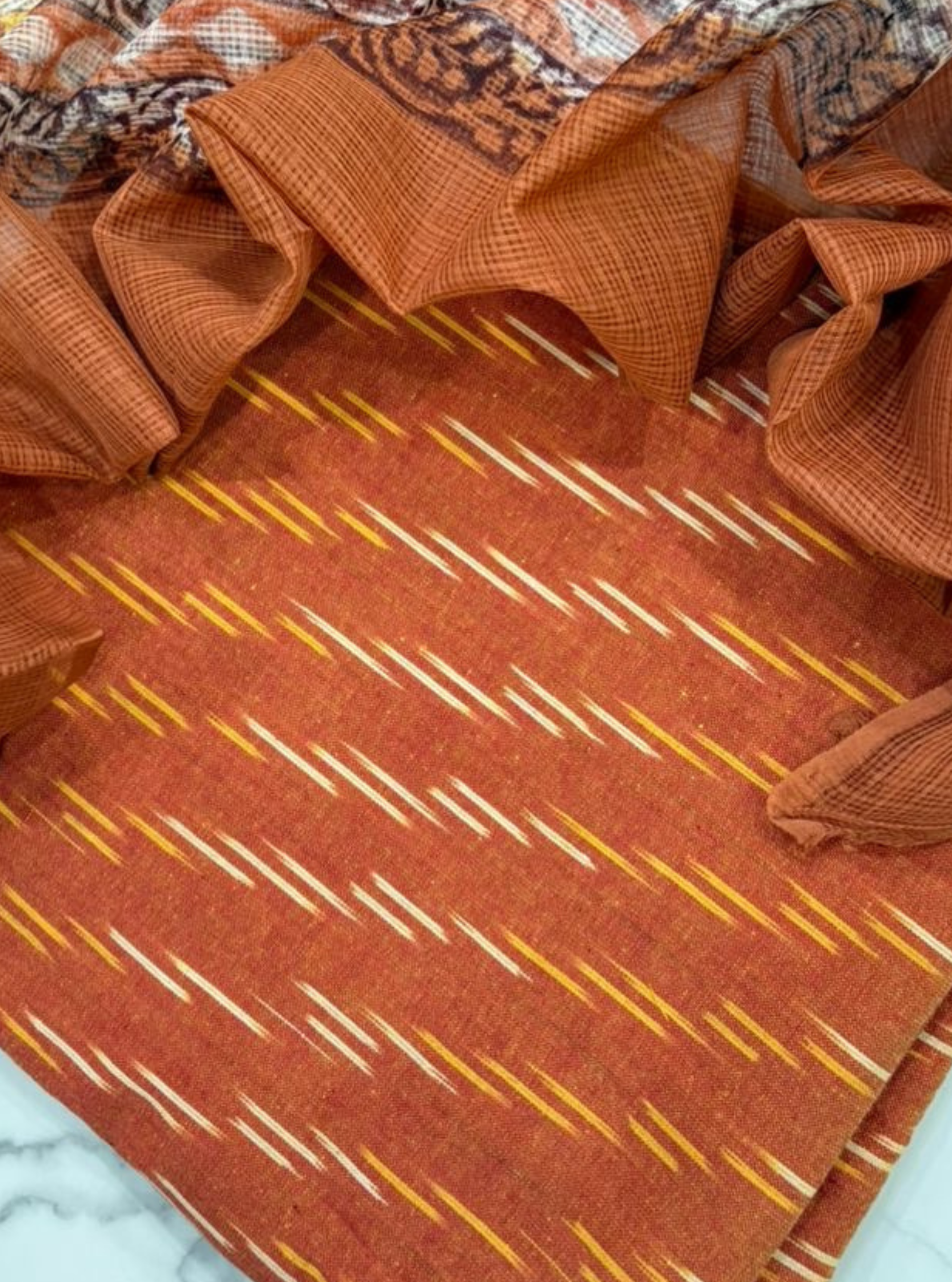 Rust orange Ikkat Kurta with Kotadoriya Dupatta